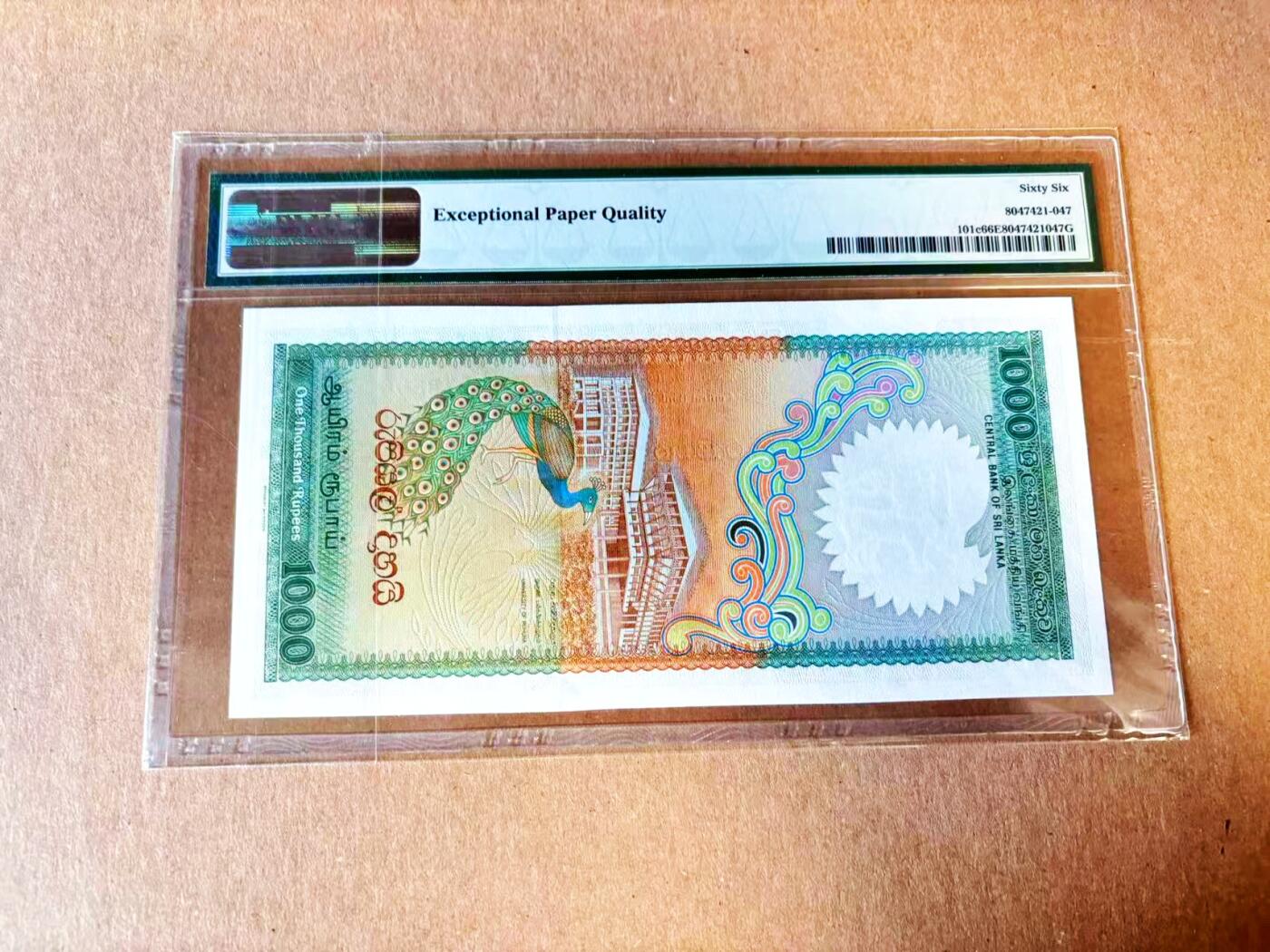  【Blue Auction】世界纸币精拍第791期——18级TOP拍卖/信誉/品质/专业/高效💫 斯里兰卡 1990年1000卢比 BWC出品 孔雀 PMG66EPQ 