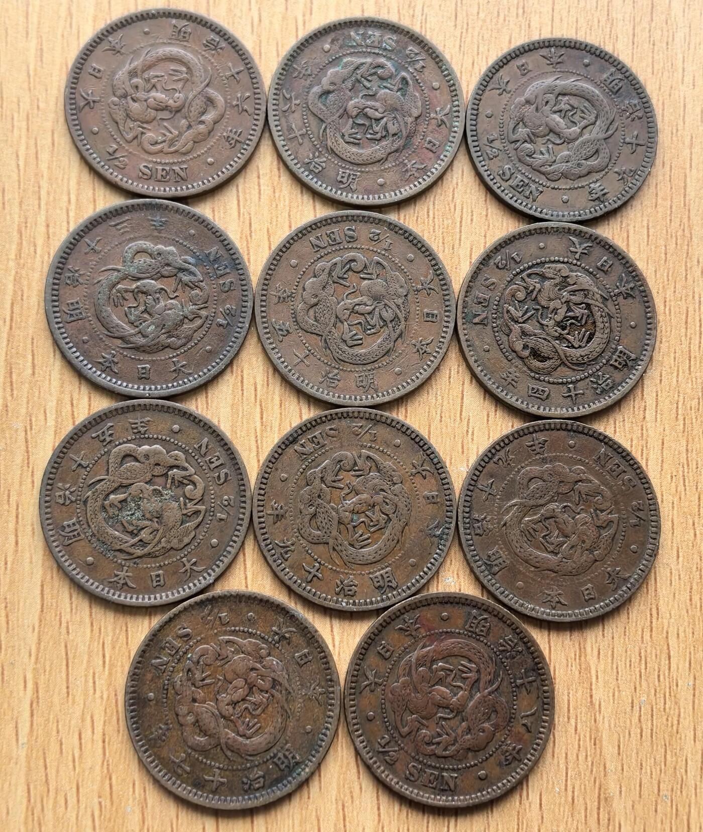 外国优质老铜币银币苏联纪念章，每周六晚九点倒数截拍，满百包邮可寄存，持续收拍 日本明治时期的半钱铜币9枚，发行于 1880–1886年，是明治维新后推行 “新货条例” 的产物，采用十进制货币体系，正面龙纹象征皇权，背面 “半钱” 字样与兑换说明，用于完善近代货币流通，是日本近代化的重要见证。