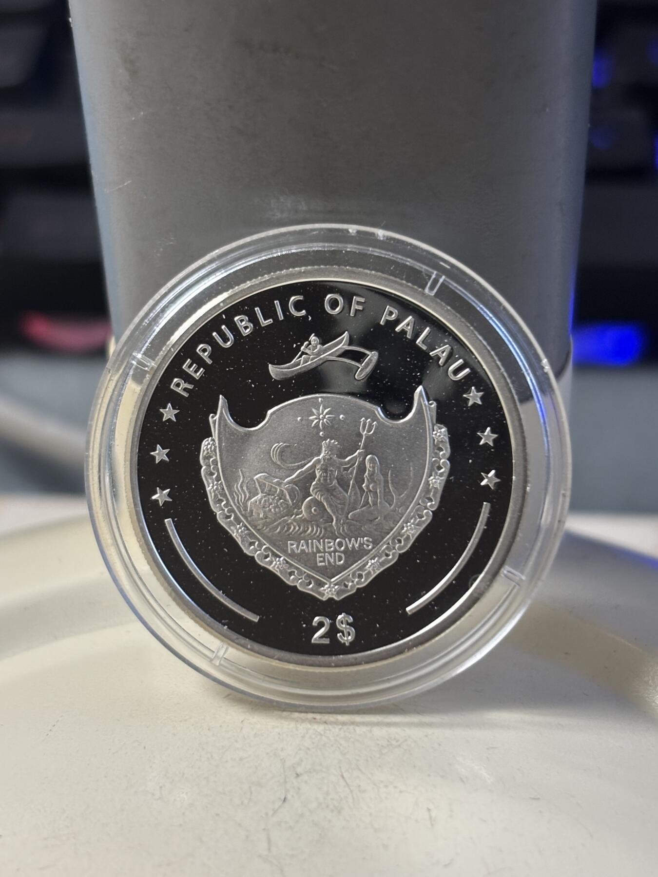 第192期拍卖 帕劳2011年奔驰专利汽车1886镀金银币，925银，10克，发行77枚