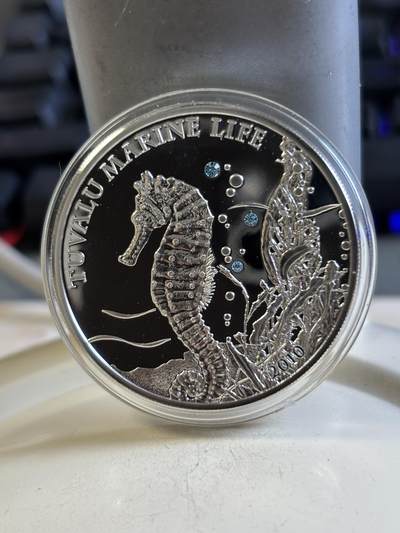 第192期拍卖 - 图瓦卢2010年海洋动物海马镶施华洛世奇蓝水晶银币25克，925银，发行2500枚