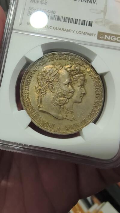 修遠堂世界钱币第106期，请看参拍说明 NGC MS62 1879年奥匈帝国皇帝弗朗茨・约瑟夫一世与皇后伊丽莎白（茜茜公主）结婚25周年2福林银币，黄油彩