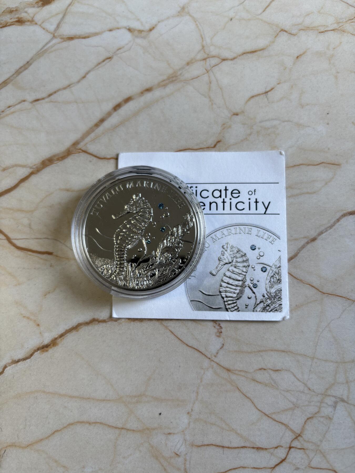 第192期拍卖 图瓦卢2010年海洋动物海马镶施华洛世奇蓝水晶银币25克，925银，发行2500枚