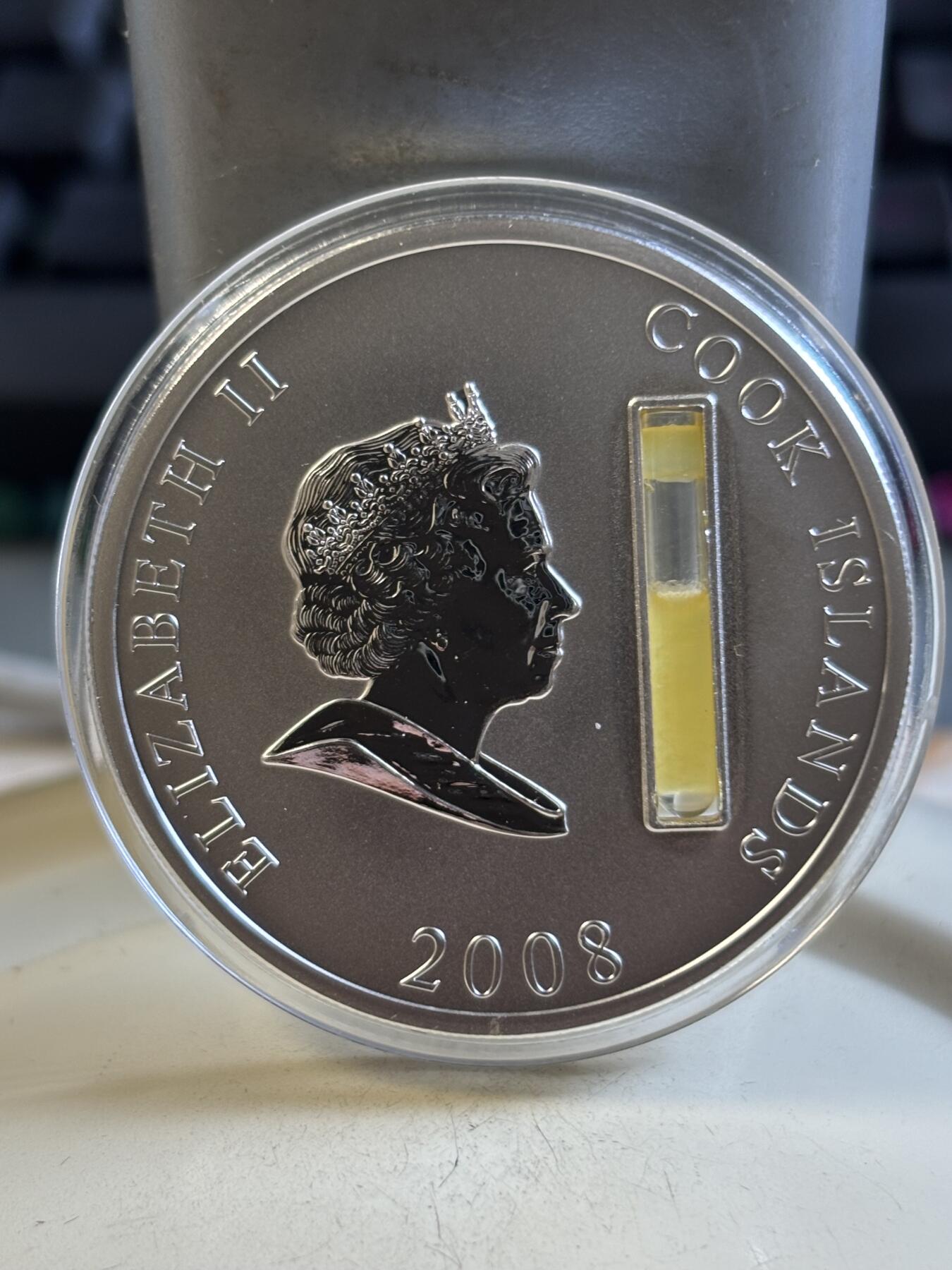 第193期拍卖 库克2009年金融大亨约翰洛克菲勒镶嵌石油纪念银币，999银，塑料盒有破