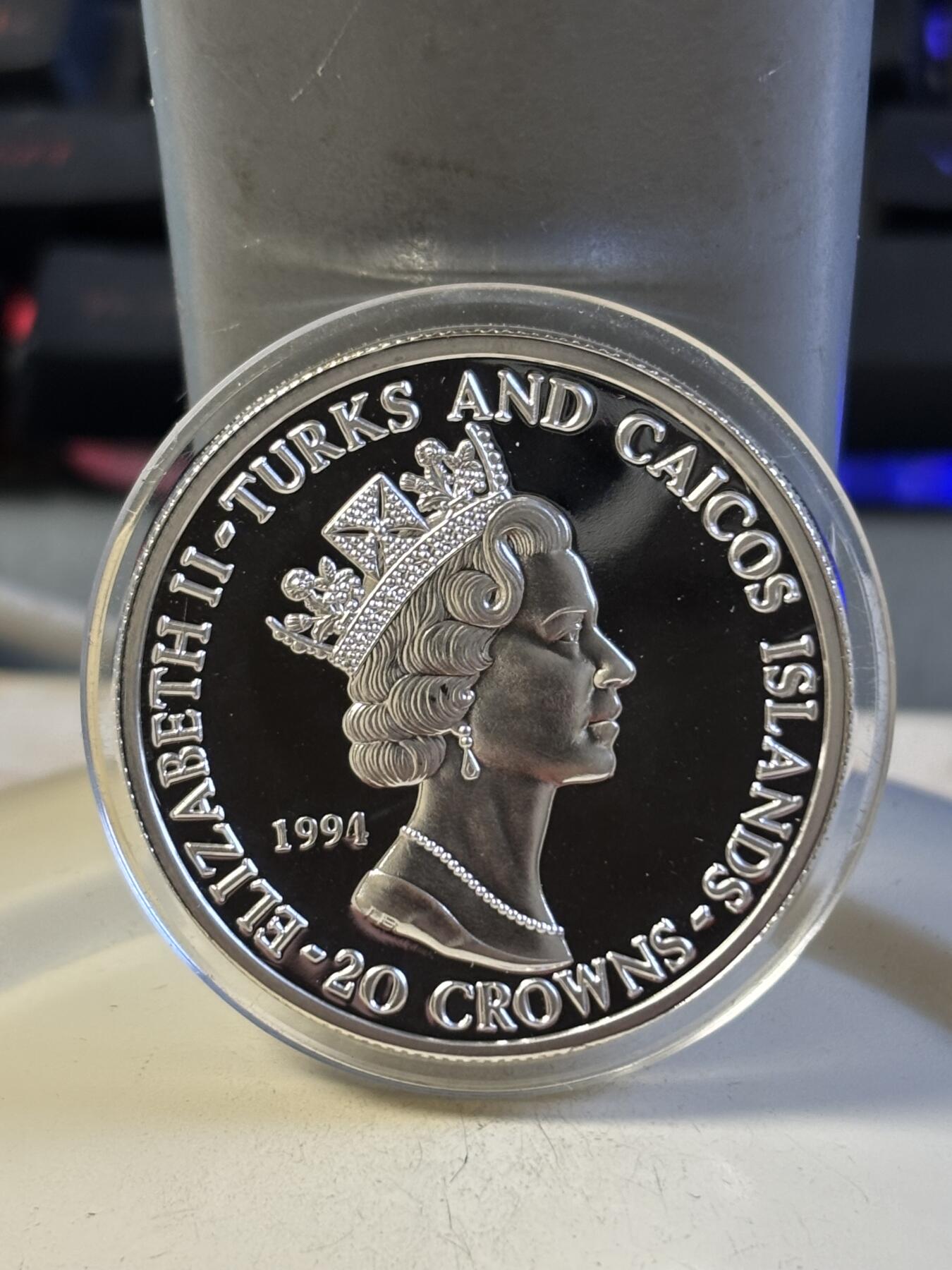 第193期拍卖 特克斯和凯科斯1994年诺曼底登陆军事人物纪念银币，31.16克，999银