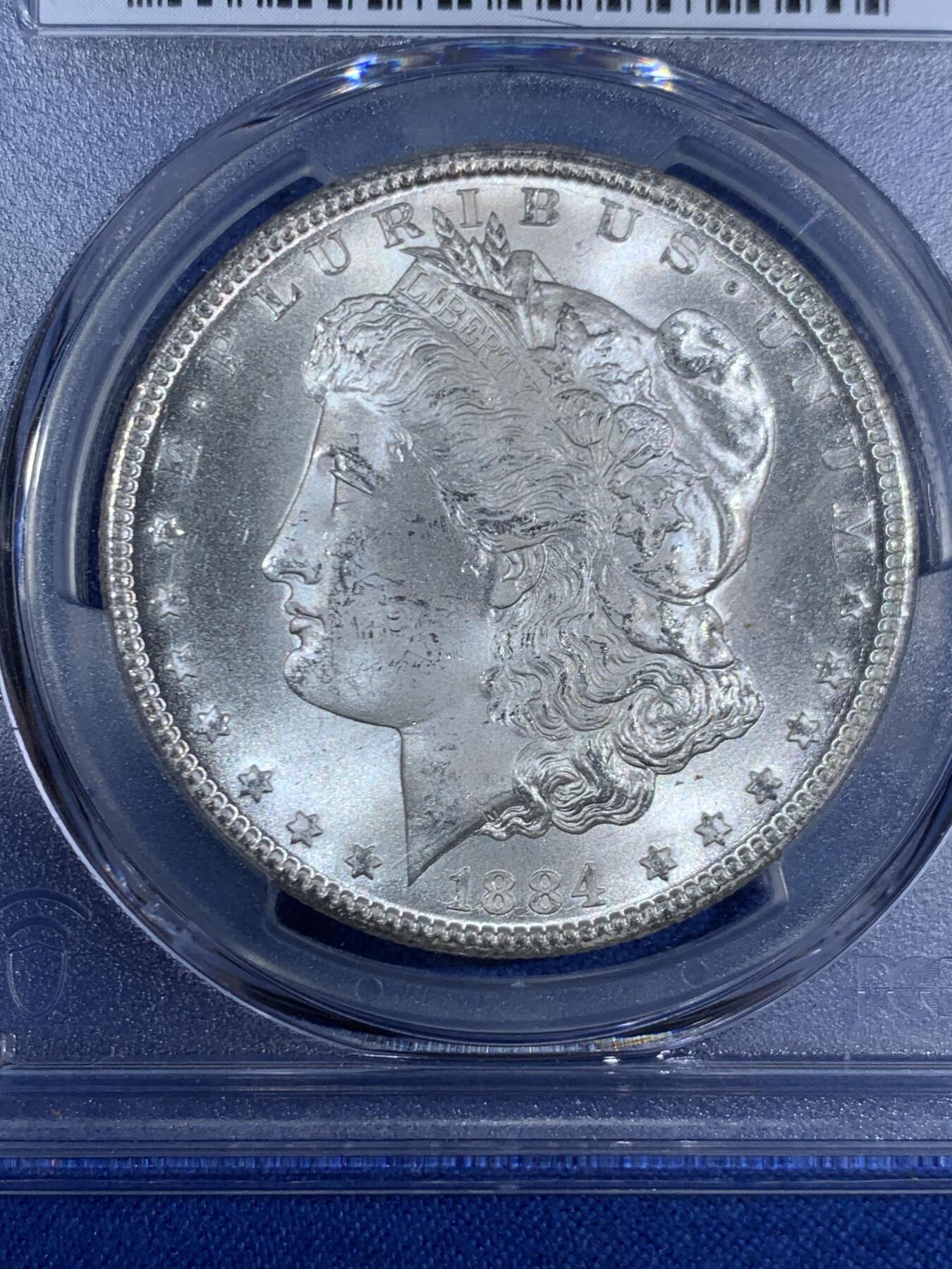 《竞宝斋》第468场 周日，周一 2场连拍 （全场包邮）欢迎送拍 PCGS MS65 美国 1884 CC 摩根 稀有卡森厂 高分难得 车轮转光