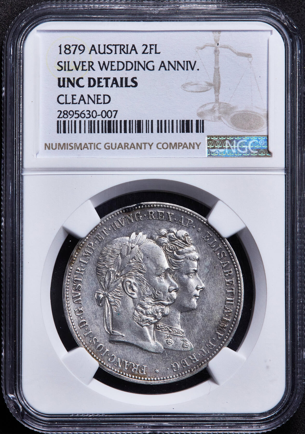 【俄甄集藏】2026年(049)03-18星期三 晚 19:30 全场包邮 奥地利1879年弗朗茨一世与茜茜公主银婚纪念2弗洛林银币，NGC UNCD，细节犀利，名誉品种，盒体边缘有小磕损，见详图
