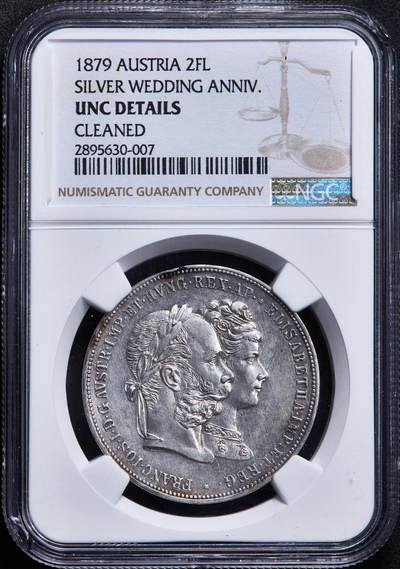 【俄甄集藏】2026年(049)03-18星期三 晚 19:30 全场包邮 - 奥地利1879年弗朗茨一世与茜茜公主银婚纪念2弗洛林银币，NGC UNCD，细节犀利，名誉品种，盒体边缘有小磕损，见详图