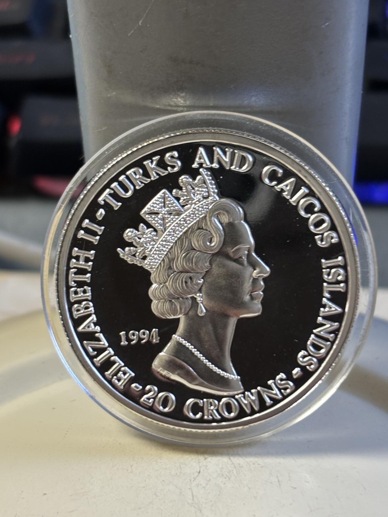 第193期拍卖 特克斯和凯科斯1994年诺曼底登陆军事人物纪念银币，31.16克，999银