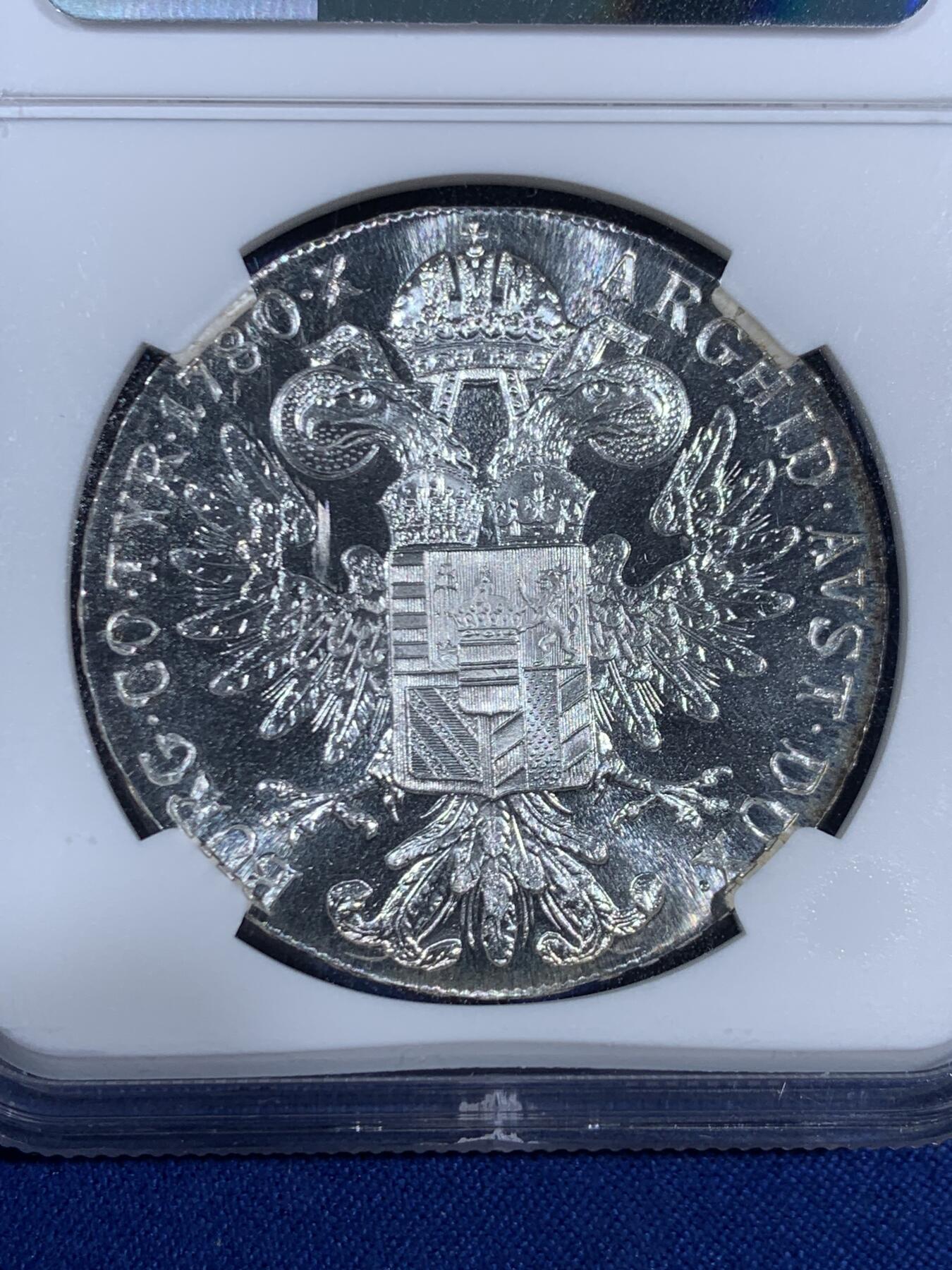 《竞宝斋》第468场 周日，周一 2场连拍 （全场包邮）欢迎送拍 NGC MS64 奥地利1780年特蕾莎大奶妈1泰勒银币，目录号HAFNER-51C，为上世纪早期维也纳厂铸造的少量错版，背面铭文错打成ARGHID，非常罕见！