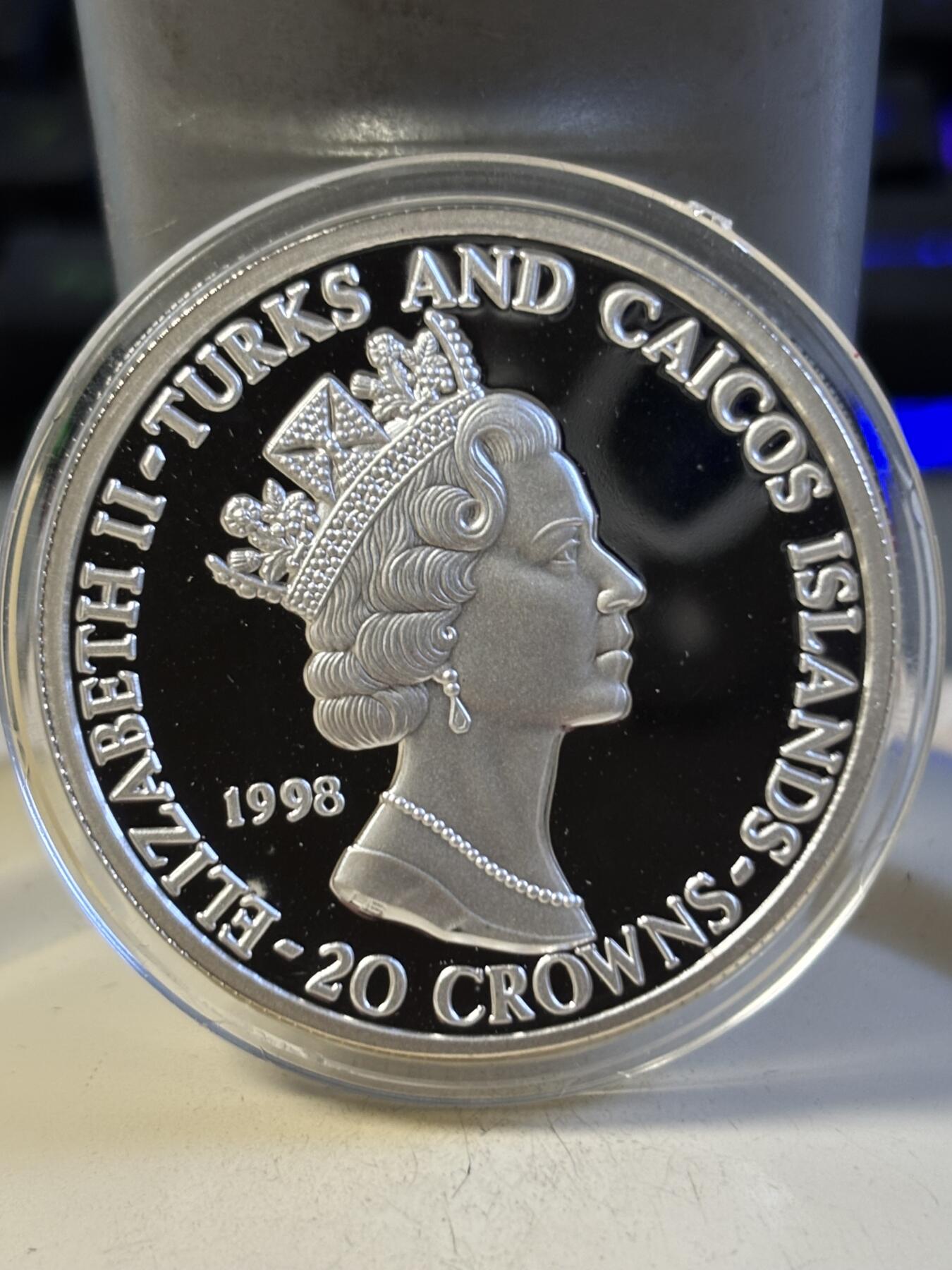 第193期拍卖 特克斯和凯科斯1998年皇家空军之战斗机28.28克纪念银币2，999银，38.61毫米