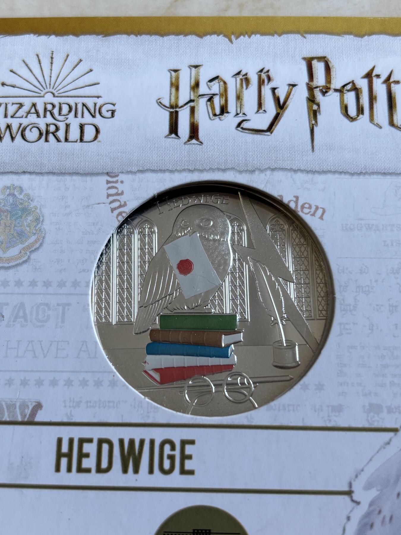 第193期拍卖 法国2021年哈利波特系列2组海德薇的信50欧彩银币原卡册，900银，41克