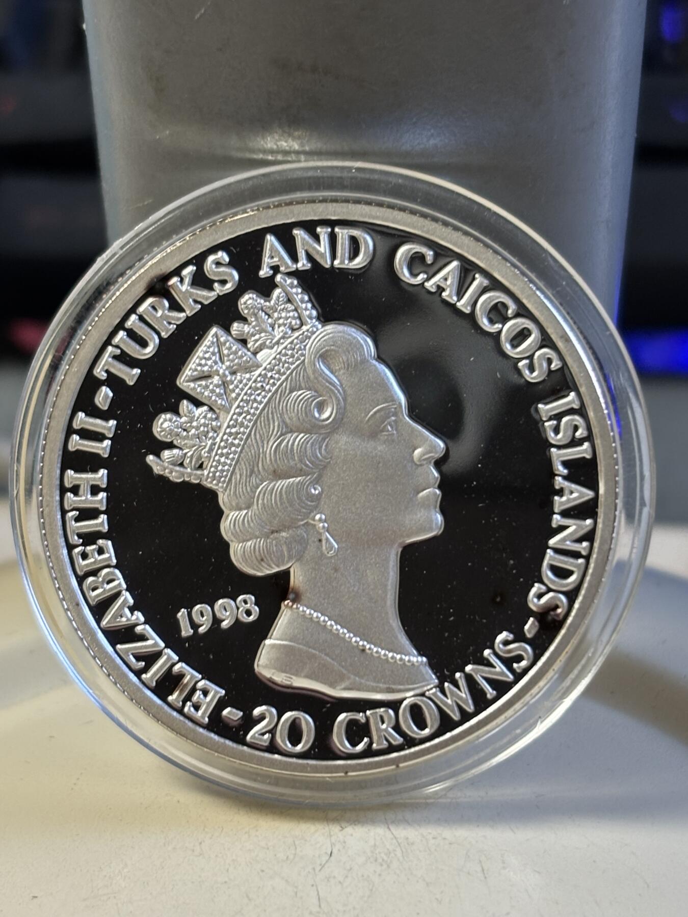 第193期拍卖 特克斯和凯科斯1998年皇家空军之战斗机28.28克纪念银币1，999银，有黑点