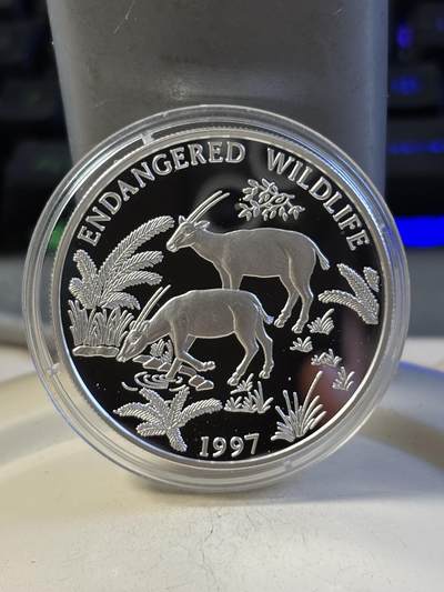 第193期拍卖 - 老挝1997年濒危野生动物长角沙奥拉纪念银币，1盎司，925银，发行15000枚