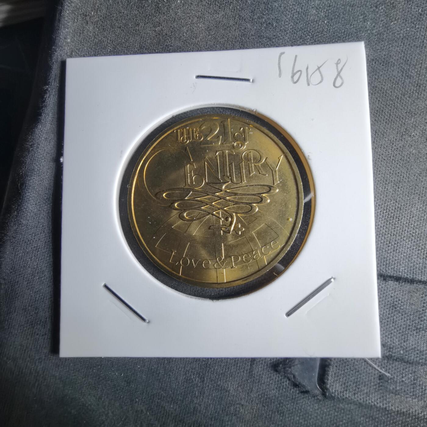 沼泽如烟--第1016场 新世纪纪念章