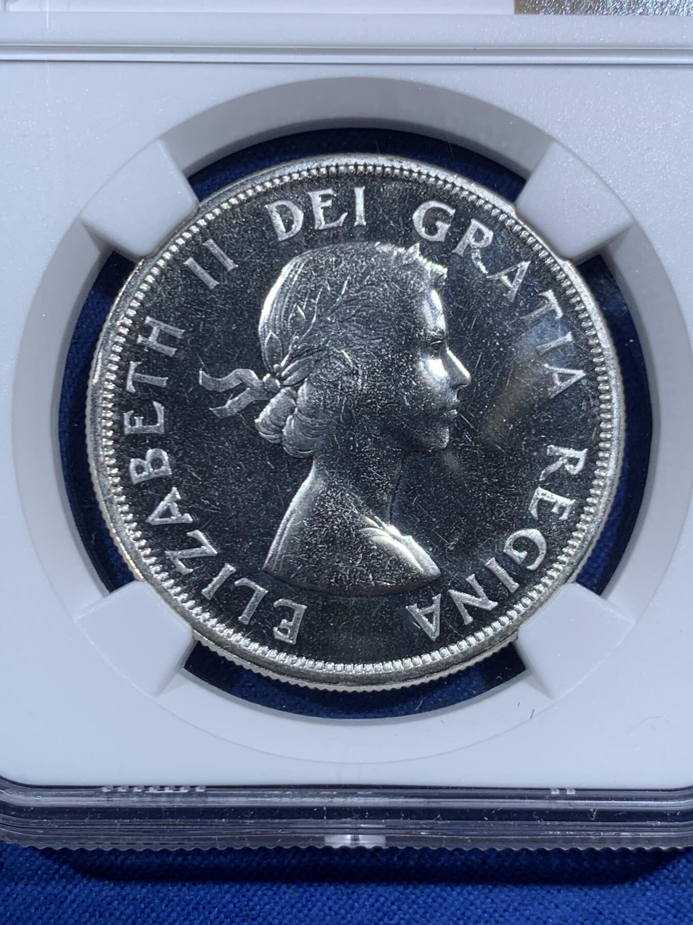 《竞宝斋》第469场 周日，周一 2场连拍 （全场包邮）欢迎送拍 NGC PL64 加拿大1963年1元银币 23.33克 800银 镜面感十足