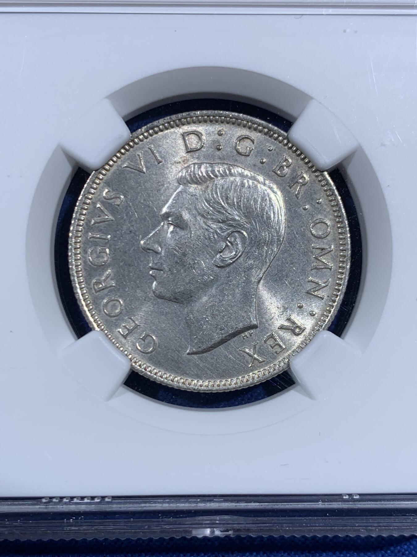 《竞宝斋》第469场 周日，周一 2场连拍 （全场包邮）欢迎送拍 NGC UNCD 英国1944年弗洛林银币，银光不错，疑似错杀