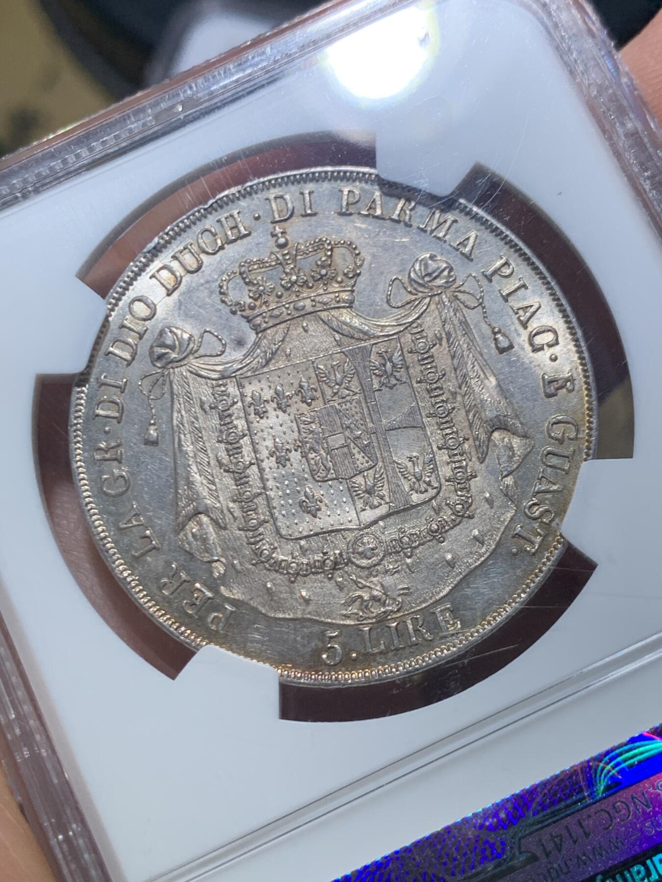 《竞宝斋》第469场 周日，周一 2场连拍 （全场包邮）欢迎送拍 NGC AU58 意大利帕尔马1832/15骑字5里拉大银币，正面为拿破仑皇后、女大公玛丽亚·露易丝，背面公国纹章繁复华丽。底板PL感足，实物观感极佳，不输MS，堪称同分中的战斗机。骑字版尤为稀少，更高仅有7枚。意系法系交汇的名誉品，国际拍卖大热点