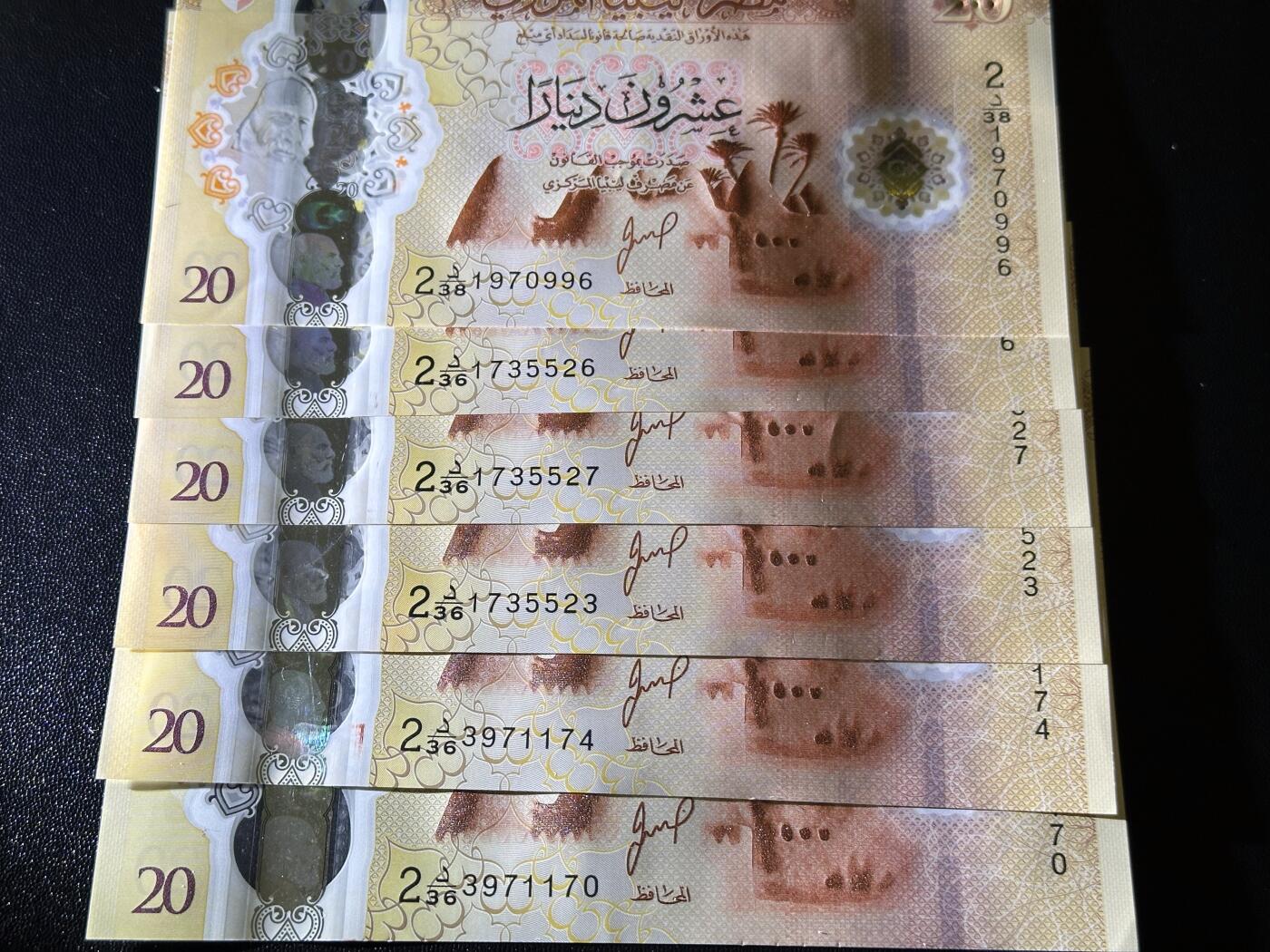 《外钞收藏家》第六百一十六期（精品场）（长期征集拍品、欢迎藏友们联系合作） 利比亚塑料钞版20第纳尔 六张一起 全新UNC