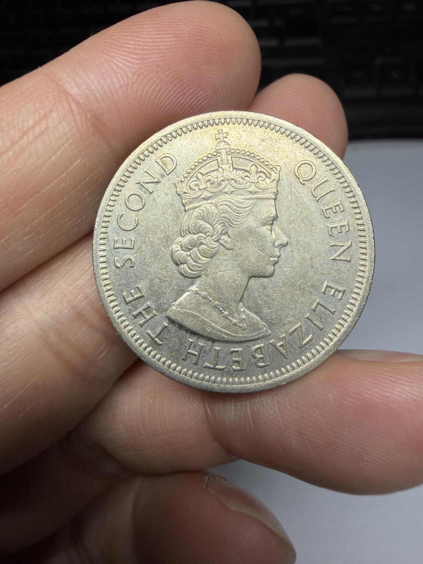 2026年集古藏今外币拍卖第三期-第1场—（总第311拍），可以寄存60天，满160元包邮。 好品1974年香港大一元