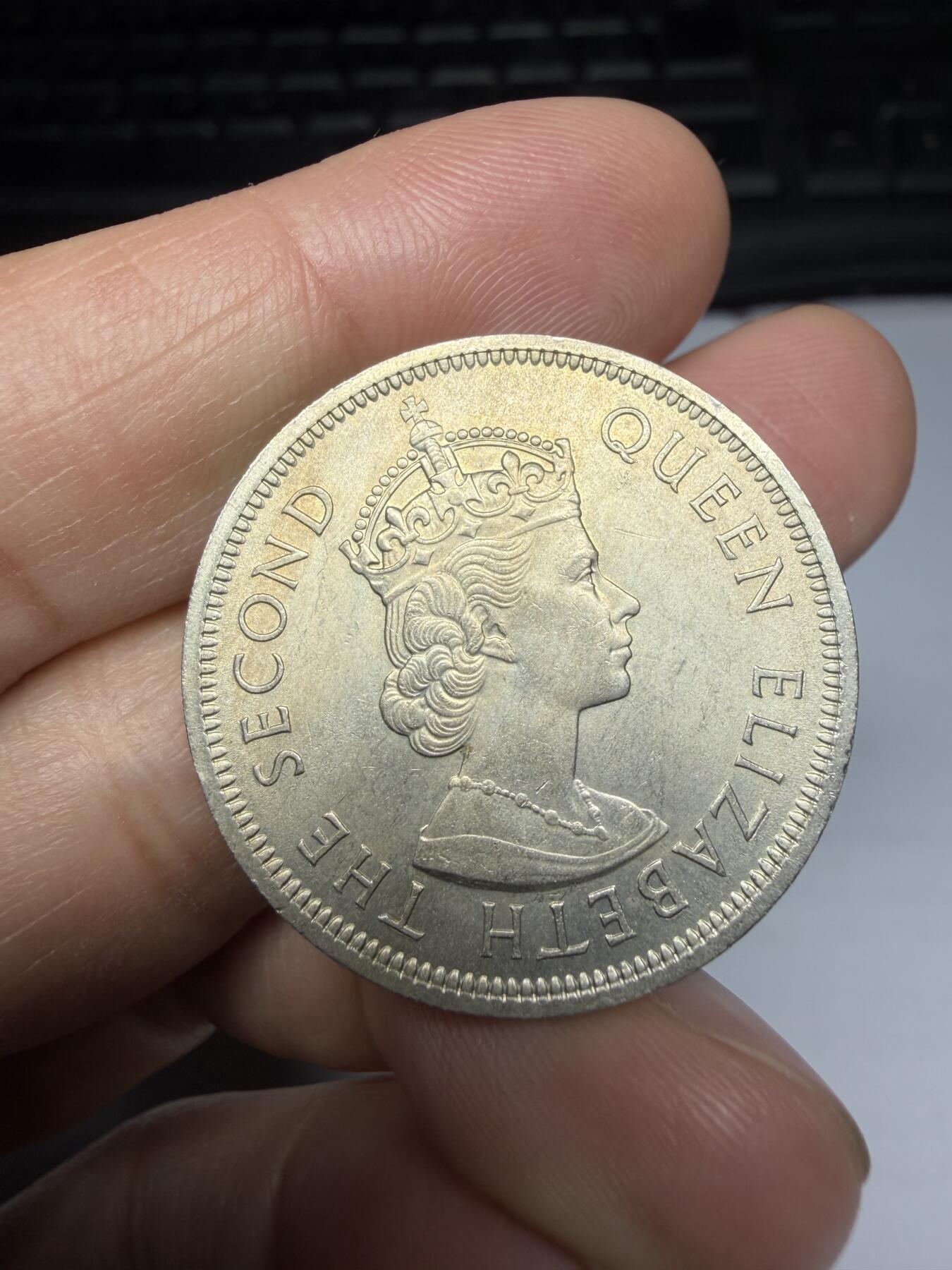 2026年集古藏今外币拍卖第三期-第1场—（总第311拍），可以寄存60天，满160元包邮。 好品1960年香港大一元