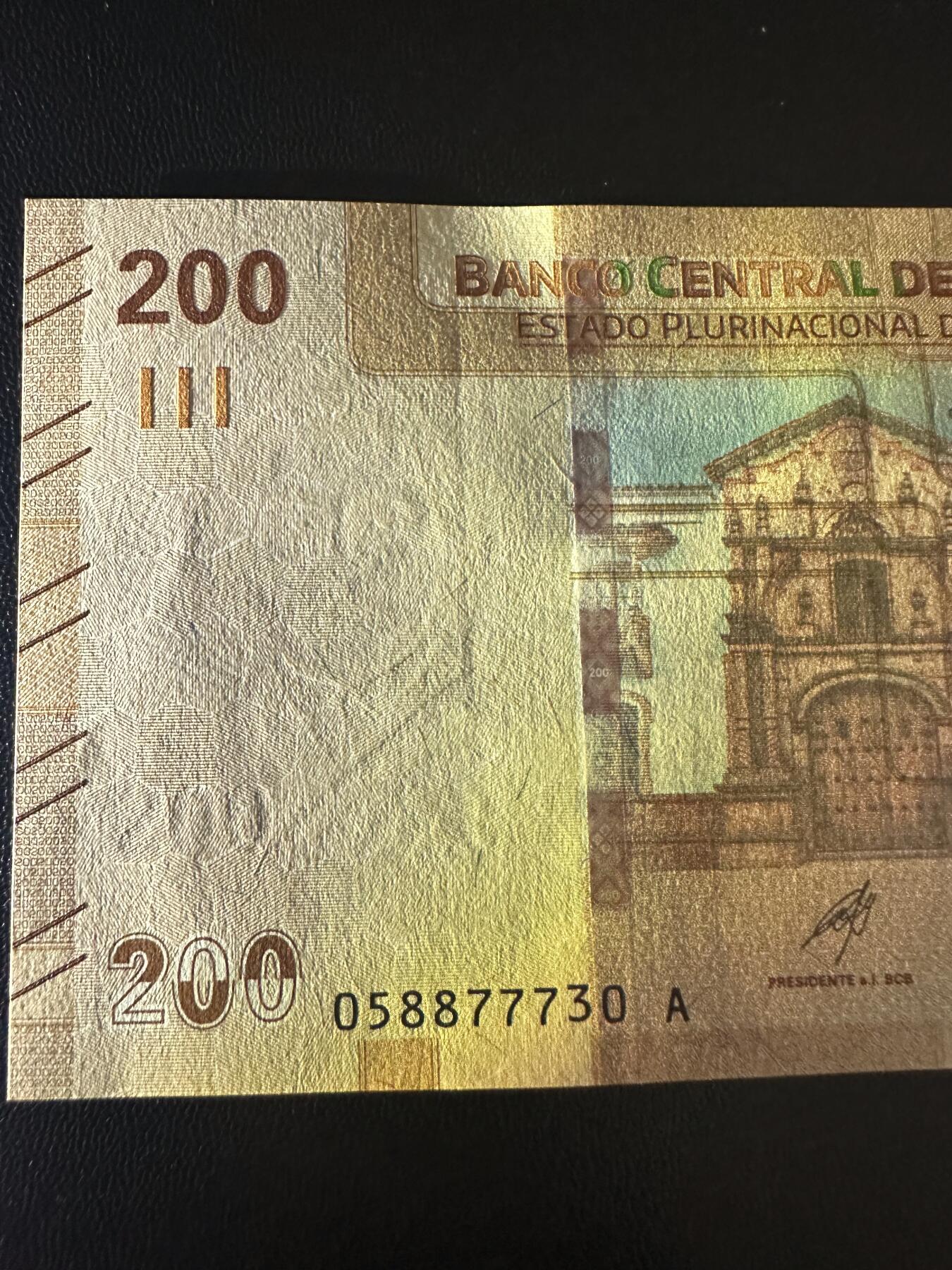 《外钞收藏家》第六百一十六期（精品场）（长期征集拍品、欢迎藏友们联系合作） 玻利维亚100 A冠 无4 全新UNC有个轻微压痕 尾730