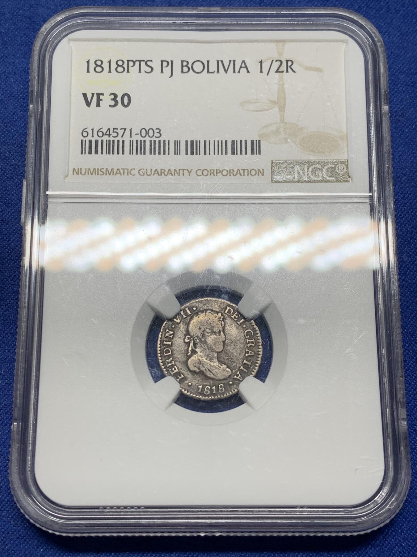 《竞宝斋》第469场 周日，周一 2场连拍 （全场包邮）欢迎送拍 NGC VF30 西属玻利维亚1818年1/2雷亚尔双柱人像银币，辅币量小的多，费七版，少见品种，年份不错，NGC出分仅5枚