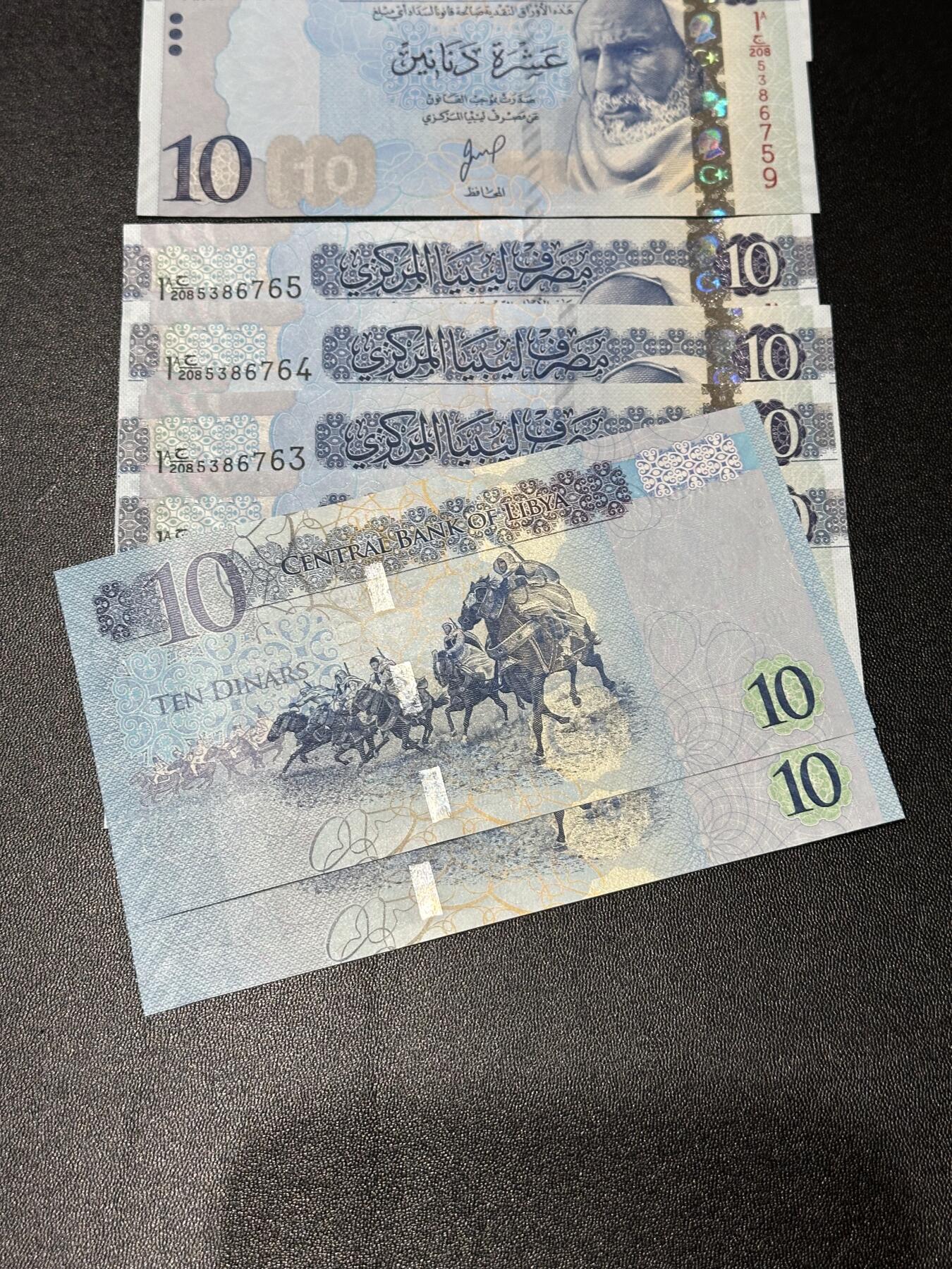 《外钞收藏家》第六百一十六期（精品场）（长期征集拍品、欢迎藏友们联系合作） 利比亚10第纳尔 10张一起 部分连号 全新UNC