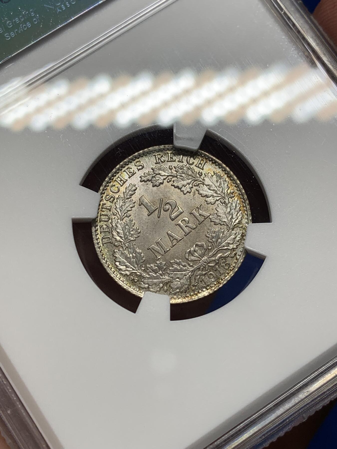 《竞宝斋》第469场 周日，周一 2场连拍 （全场包邮）欢迎送拍 NGC MS66 德国1918年1/2马克银币，五彩包浆，状态极佳，高分藏品