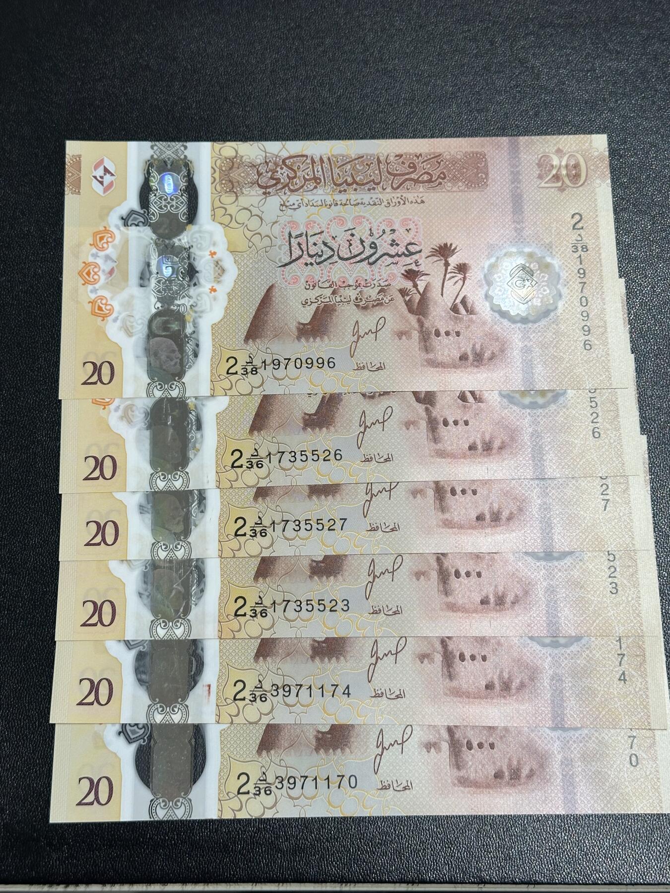 《外钞收藏家》第六百一十六期（精品场）（长期征集拍品、欢迎藏友们联系合作） 利比亚塑料钞版20第纳尔 六张一起 全新UNC