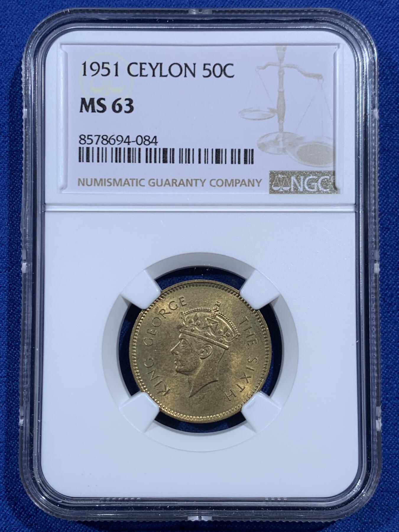 《竞宝斋》第469场 周日，周一 2场连拍 （全场包邮）欢迎送拍 两枚一组 NGC MS63 1951清年英属锡兰乔六25/50分黄铜币，50分MS级别稀少！