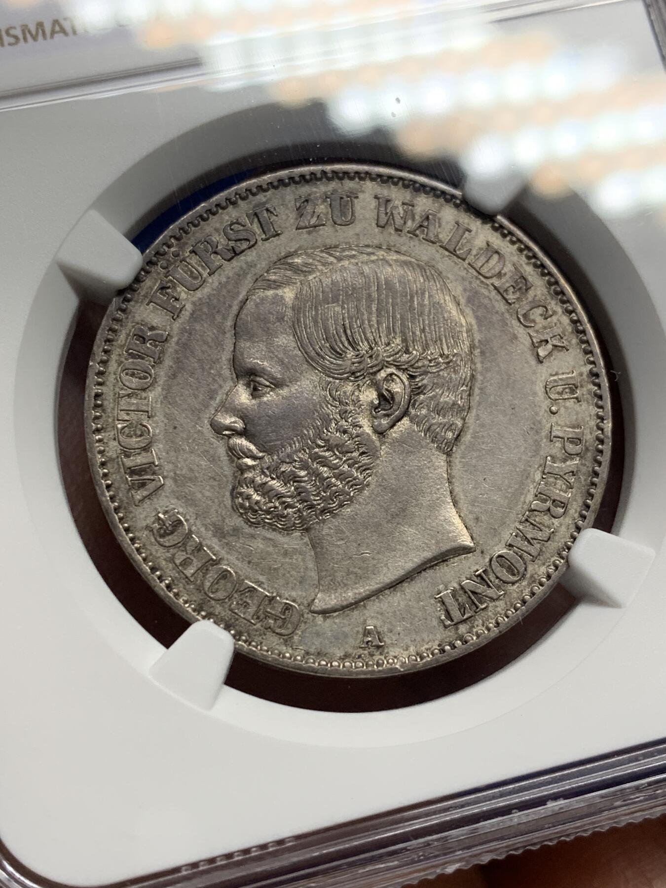 《竞宝斋》第469场 周日，周一 2场连拍 （全场包邮）欢迎送拍 NGC AUD 德国 德意志 1泰勒 瓦尔德克 Thun.410 KM#0135 (1859-1867) 格奥尔格·维克多 1867年  双年发行，高难小邦，1867年仅发行19000枚，纸袋包浆。