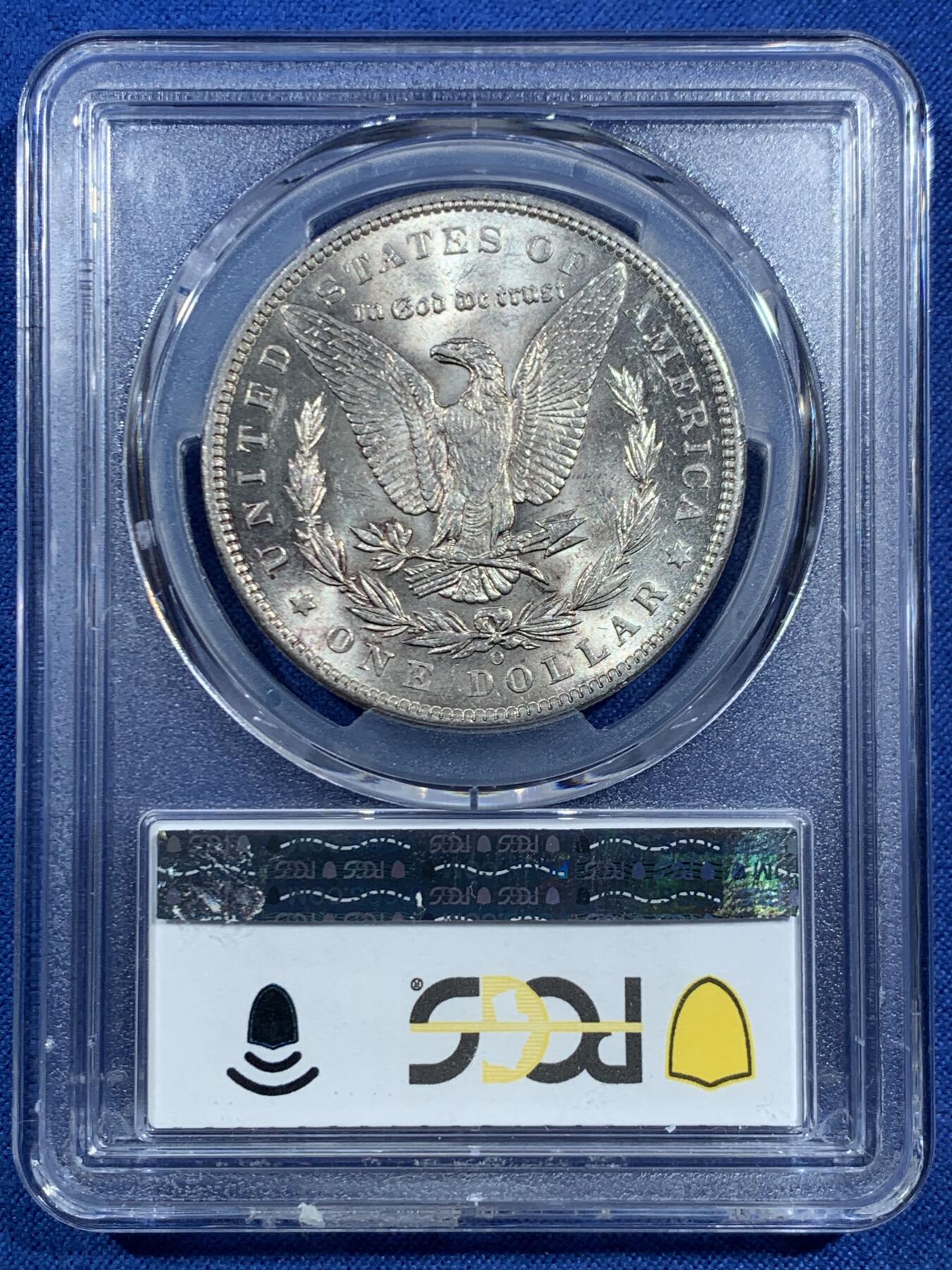 《竞宝斋》第469场 周日，周一 2场连拍 （全场包邮）欢迎送拍 PCGS AU58 美国 1897 O 摩根银币 此年份摩根大量钱币於法案中被融毁 因此好品难寻 麦稀奇首见如此高分稀有钱币 此币乃收藏中必不可少的一环 转光犀利 PCGS指导价3991