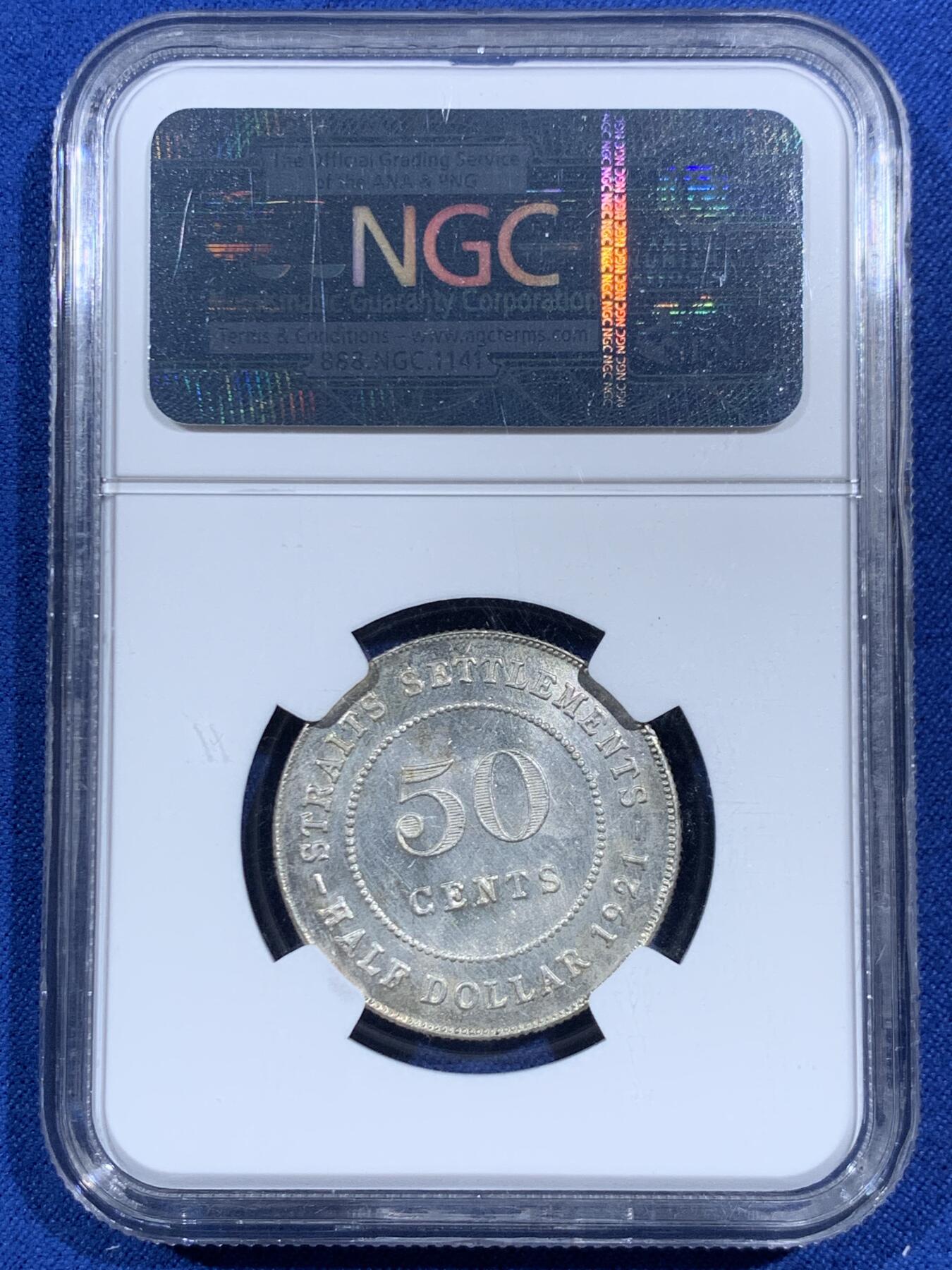 《竞宝斋》第469场 周日，周一 2场连拍 （全场包邮）欢迎送拍 NGC MS64 英属海峡1921年乔治五世50分银币，银光丝滑，老N盒品质保障。英系东南亚殖民地，国际热点，高分富有潜力