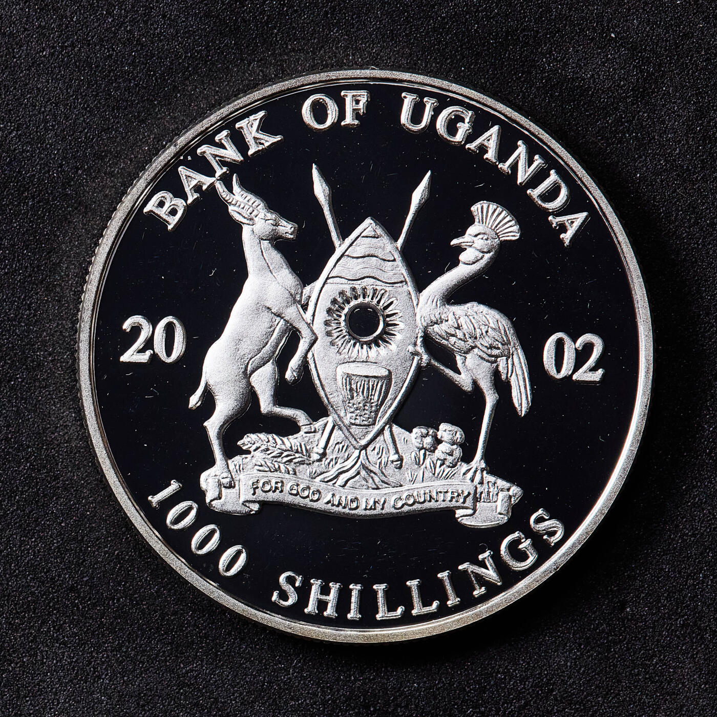 【俄甄集藏】2026年(049)03-18星期三 晚 19:30 全场包邮 乌干达2002年纪念日韩足球世界杯1000先令精制大银币，重25.1克，999银，设计简约而精美