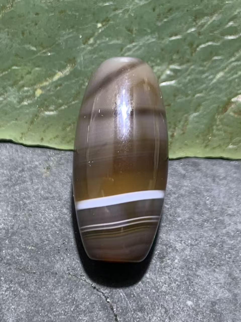 高玉化千层纹缠丝玛瑙通货随形桶珠一颗，