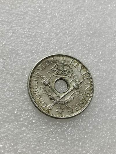 天下钱庄专场欢迎参拍 - 新几内亚中孔银币