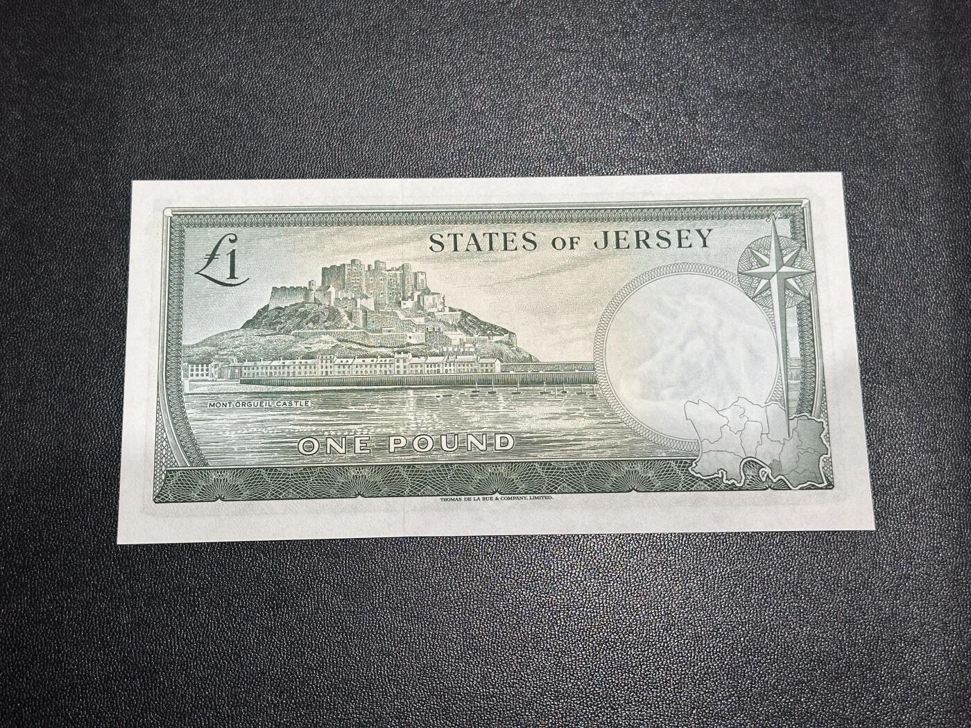 《外钞收藏家》第六百一十六期（精品场）（长期征集拍品、欢迎藏友们联系合作） 泽西 戎装女王1镑 全新 轻微潮点 号码无4