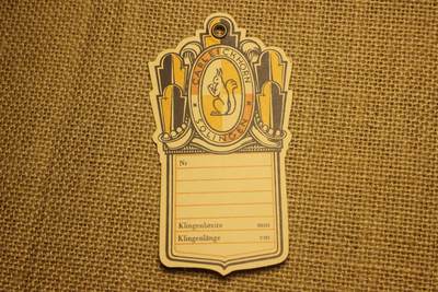 2026.3.14德系主题拍卖 - 德三索林根刀剑厂成品的纸质挂牌，年代久远纸张略有痕迹