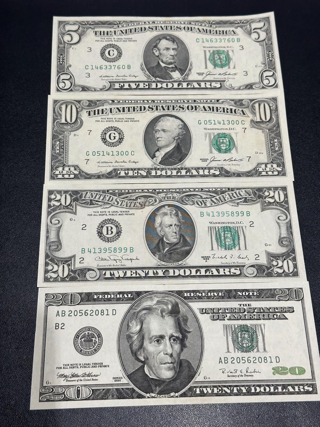 《外钞收藏家》第六百一十六期（精品场）（长期征集拍品、欢迎藏友们联系合作） 美国小头版5、10、20美元 全新轻微潮+大头版20美元AU 四张一起