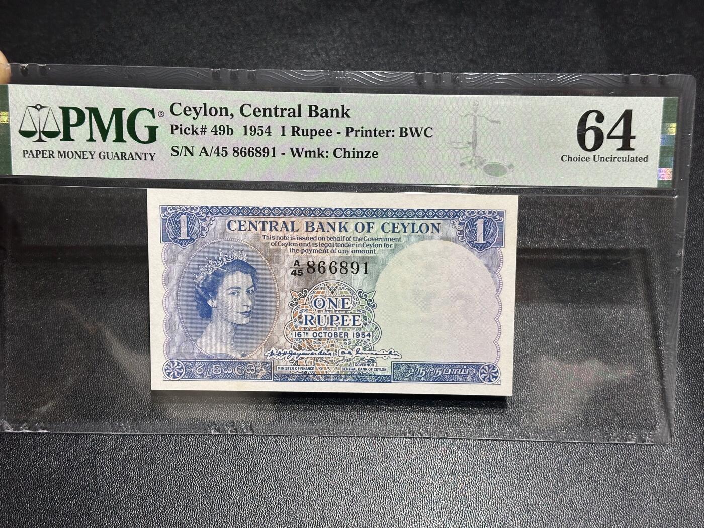 《外钞收藏家》第六百一十六期（精品场）（长期征集拍品、欢迎藏友们联系合作） 1954年英属锡兰1卢比 PMG64 无47 BWC作品