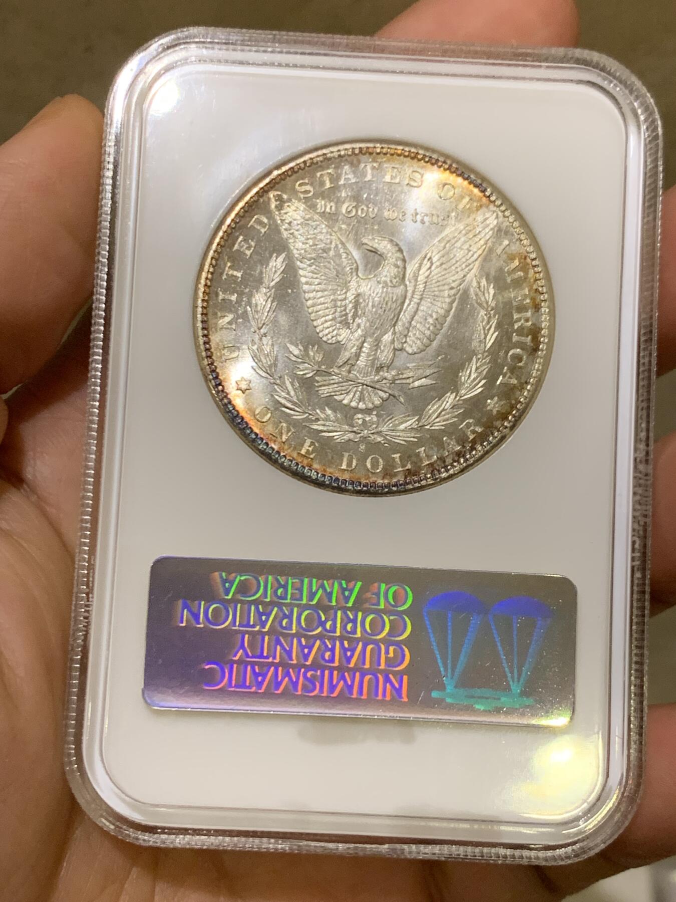 《竞宝斋》第469场 周日，周一 2场连拍 （全场包邮）欢迎送拍 NGC MS65PL 美国1880s摩根银币 ngc老盒子 镜面感十足，胜过大部分pl摩根，转光丝滑，两面边缘黄油彩实属难得，老盒溢价＋超强镜面观感