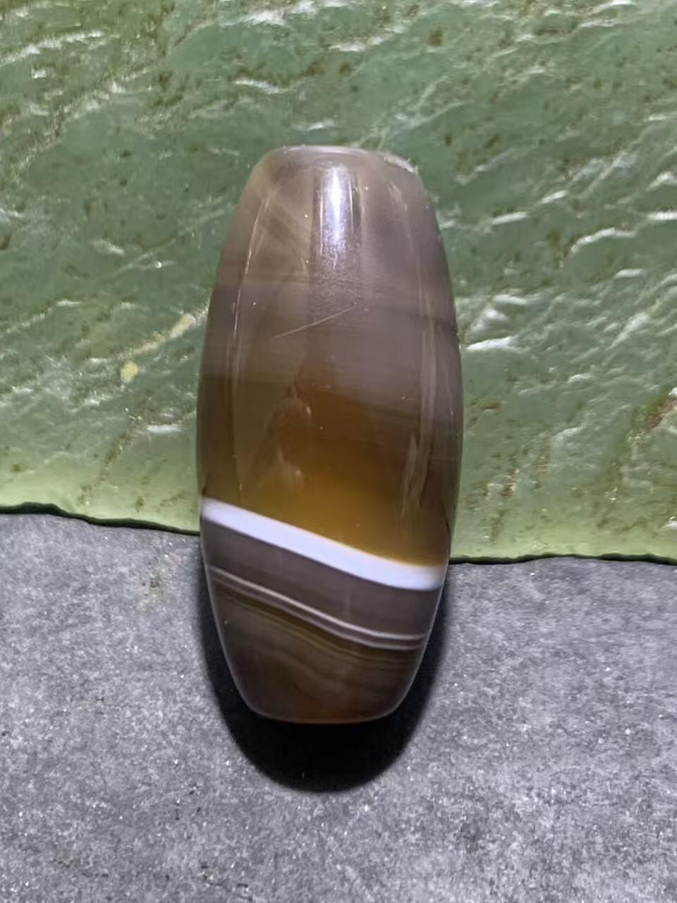 高玉化千层纹缠丝玛瑙通货随形桶珠一颗，