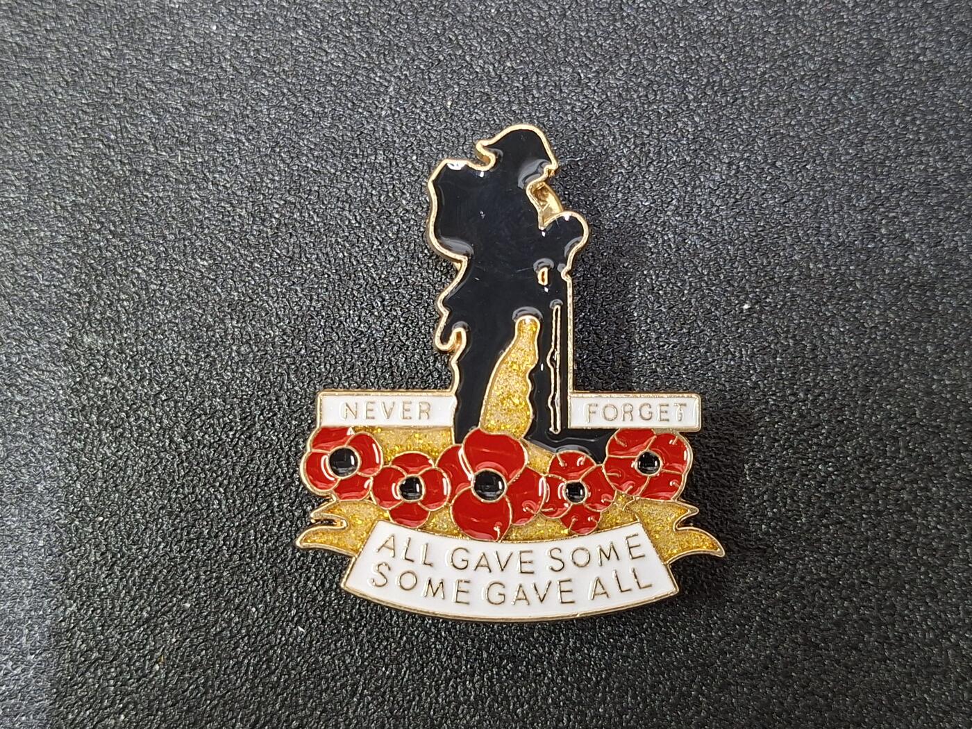 西秦中古拍卖第八十期  英国阵亡将士纪念日军人虞美人纪念章