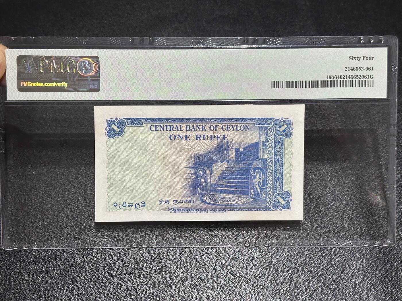 《外钞收藏家》第六百一十六期（精品场）（长期征集拍品、欢迎藏友们联系合作） 1954年英属锡兰1卢比 PMG64 无47 BWC作品