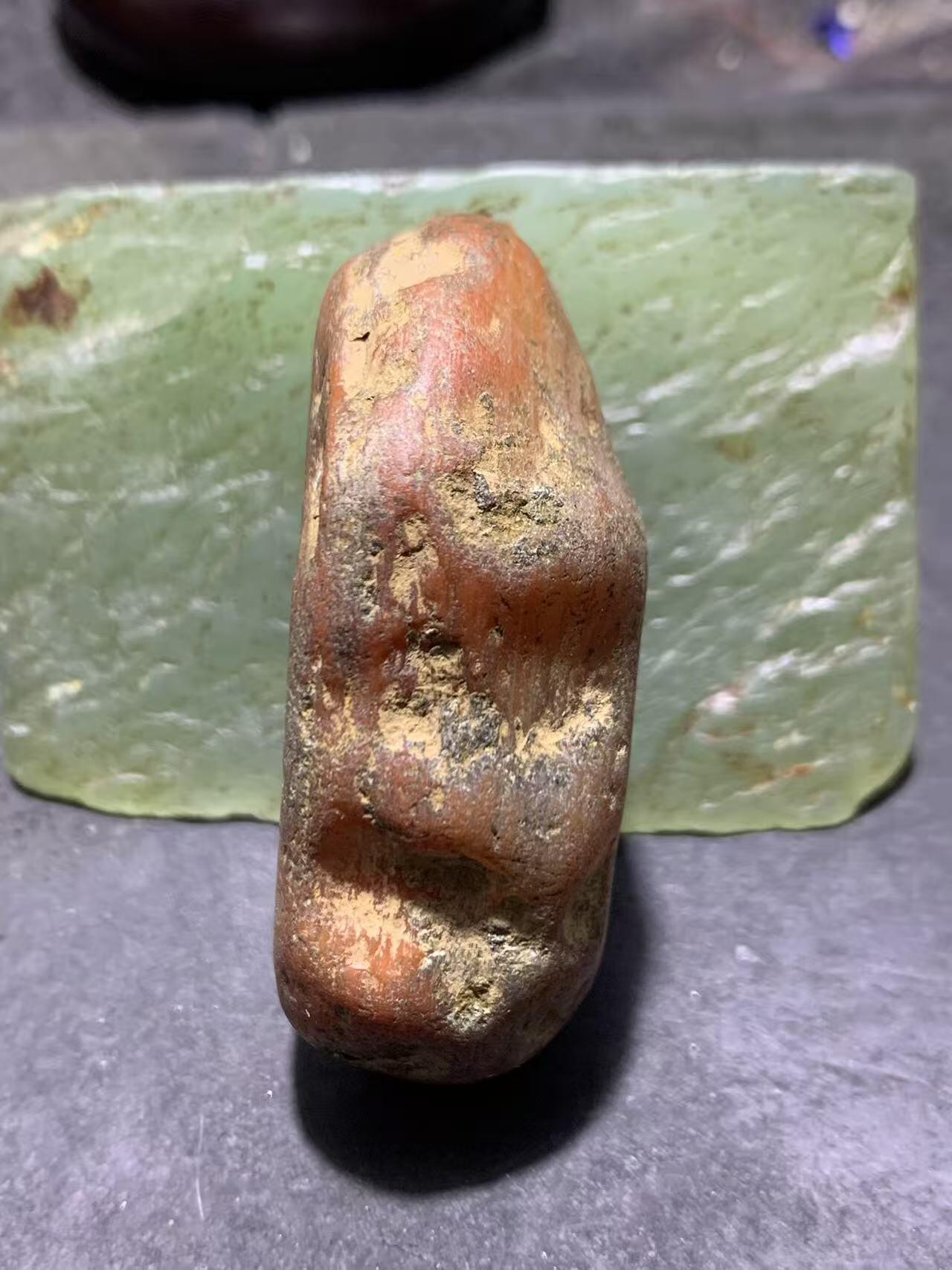 精美红皮红冻料开窗料南红玛瑙原石一颗，