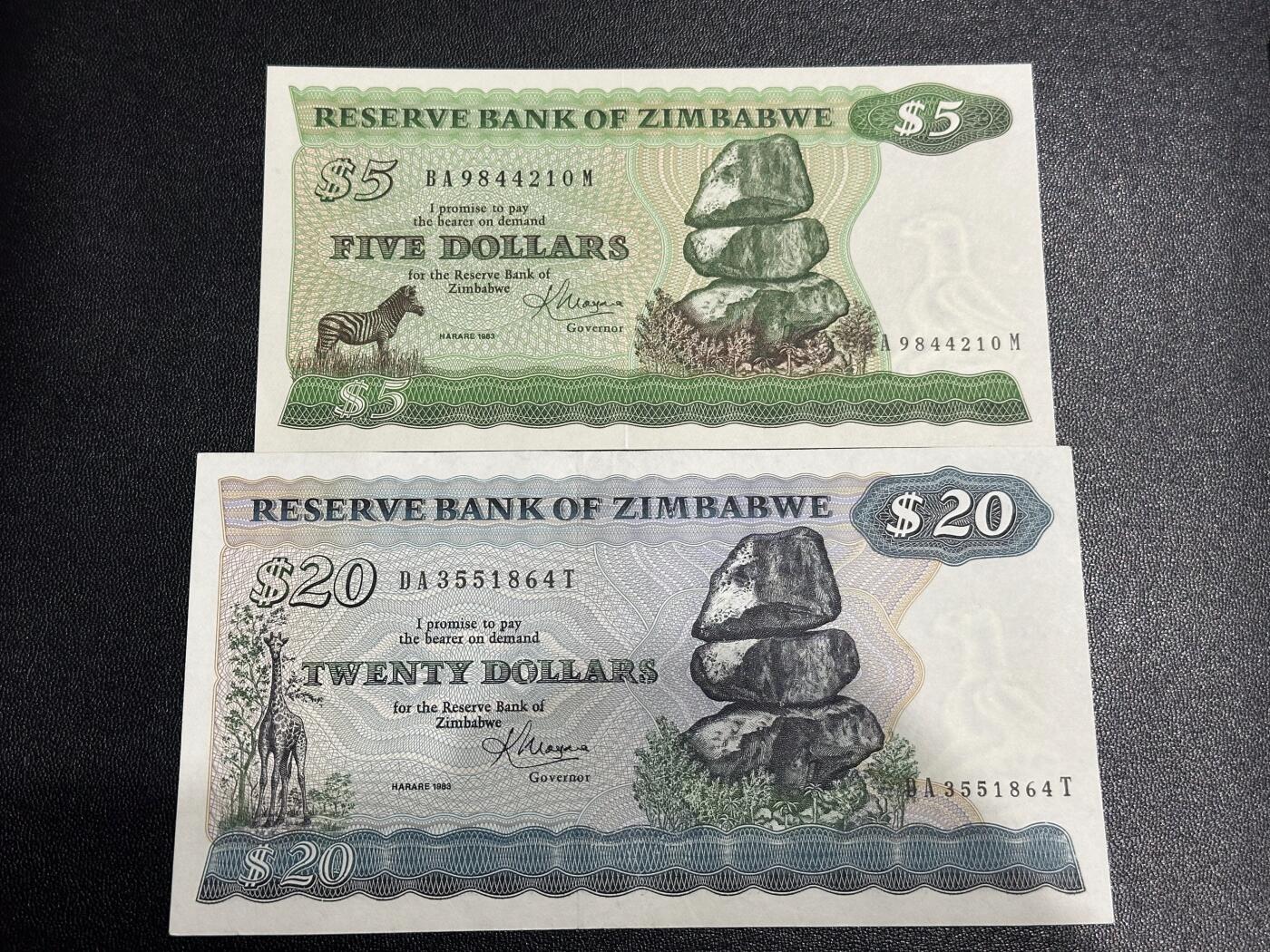 《外钞收藏家》第六百一十六期（精品场）（长期征集拍品、欢迎藏友们联系合作） 津巴布韦5元全新和20AU 2张一起