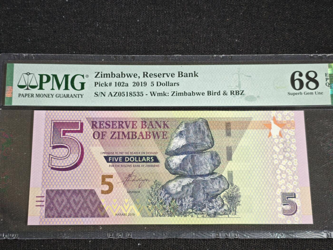 刘世昌艺术品销售中心～虎踞龙蟠*金杨在线联拍群第519期 津巴布韦2019年5元（PMG  68E   号码：AZ0518535）1枚。