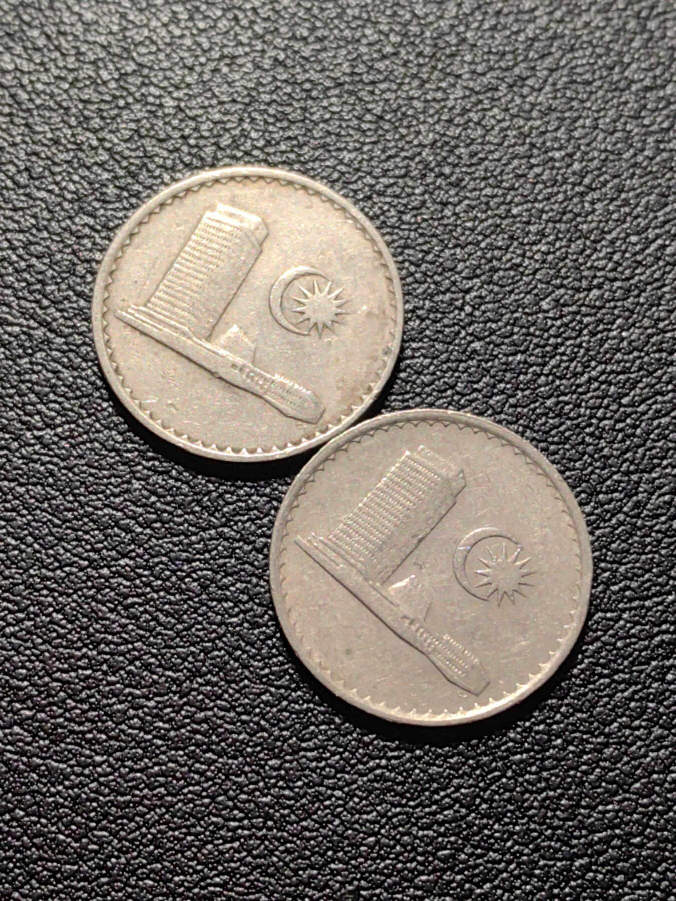 靖甫拍卖第六场 马来两枚