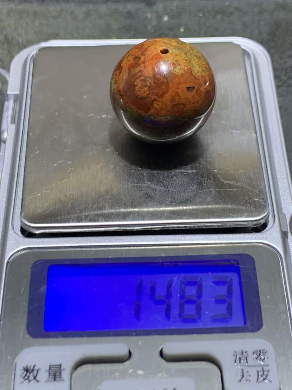 精美原皮冰飘草花纹战国红玛瑙圆珠一颗！