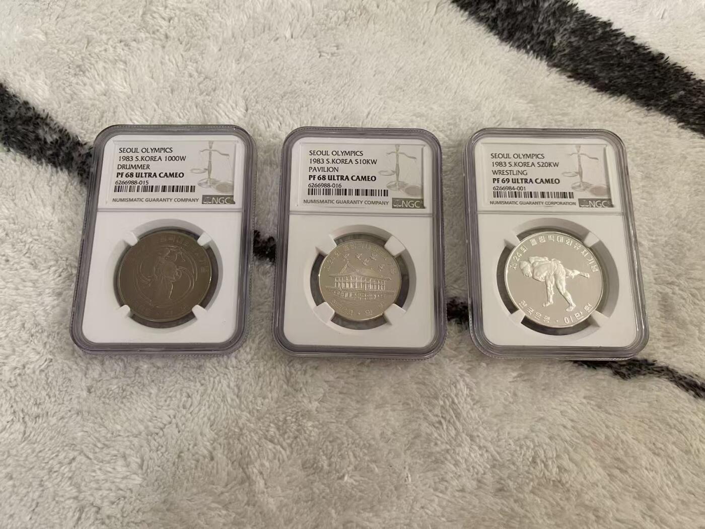 ❤️【币观天下】❤️ 第344期钱币秒杀拍卖场- 2026.3.6周五晚上6点半场 长期征集拍品  韩国1983年首尔运动会纪念币套装 全评级 含大银币